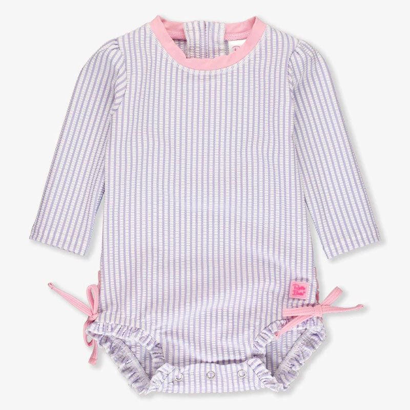 RuffleButts Seersucker Longsleeve One Piece Rash Guard In Lavender